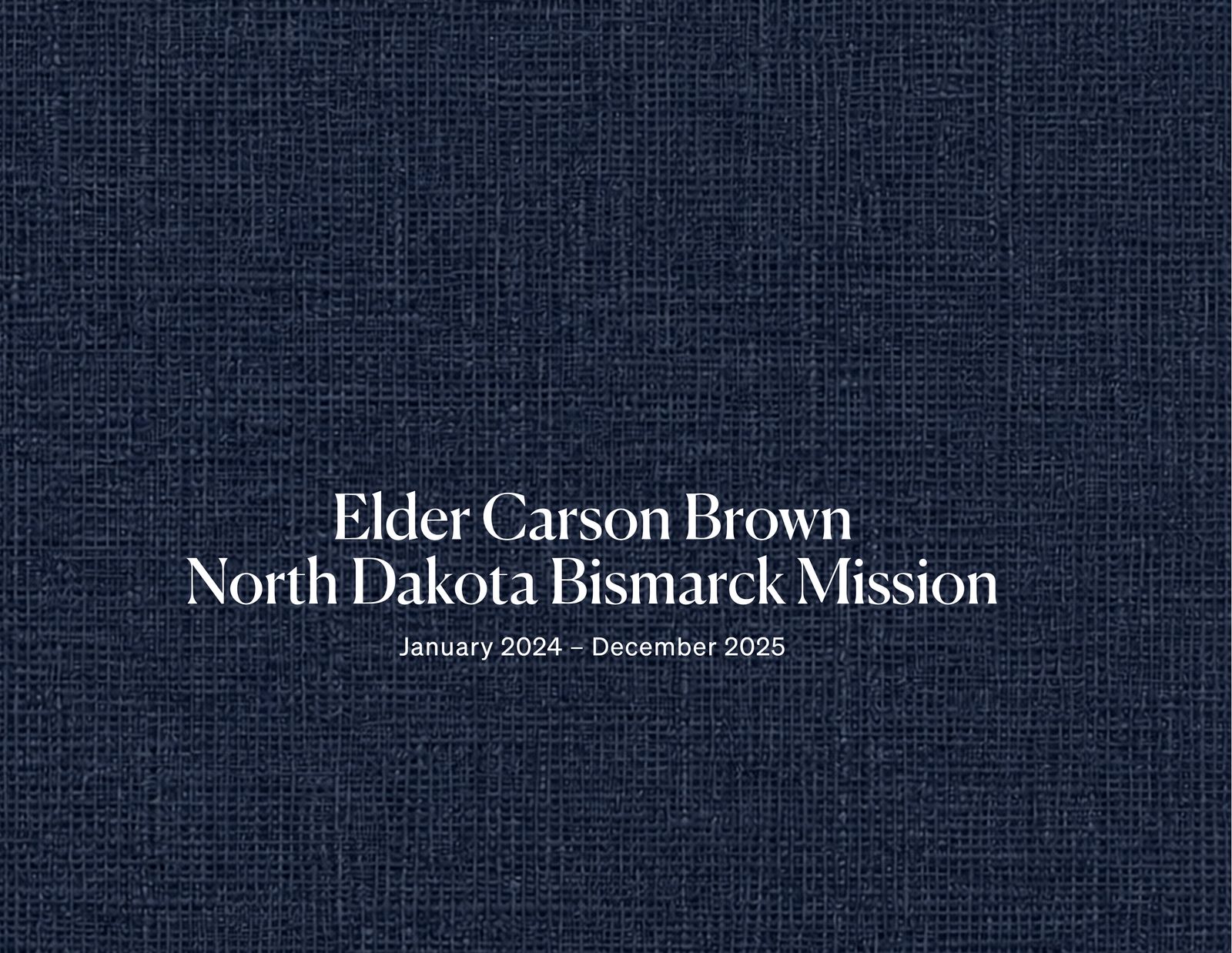The cover of Elder Carson Brown's Fieldbound missionary book — a navy linen hardcover reading 'Elder Carson Brown, North Dakota Bismarck Mission, January 2024 – December 2025.'
