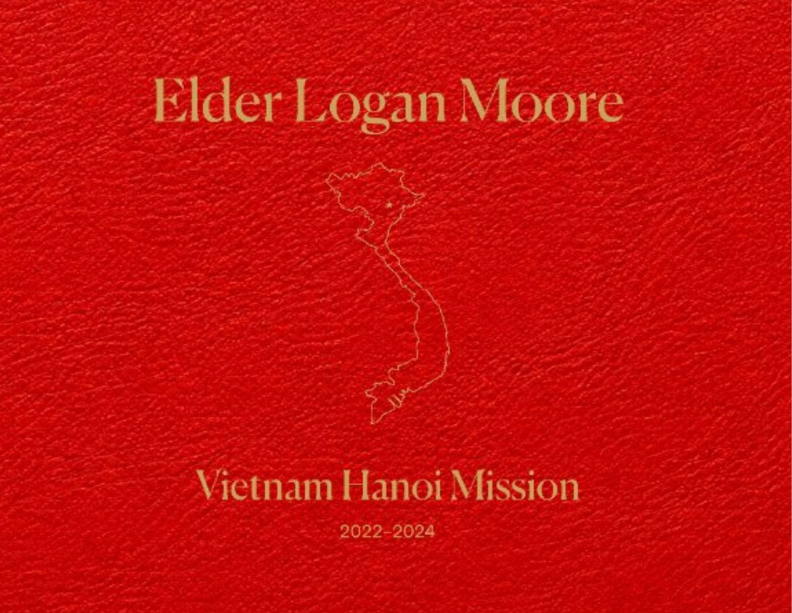 The cover of Elder Logan Moore's Fieldbound missionary book: a red leather-textured hardcover with a gold outline of Vietnam, reading Vietnam Hanoi Mission, 2022–2024.